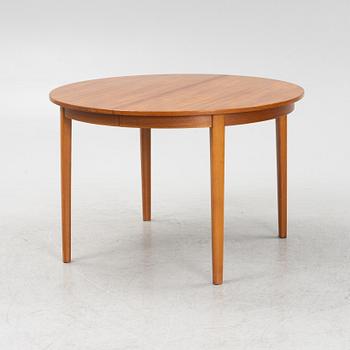 A teak-veneered dining table, second half of the 20th century.