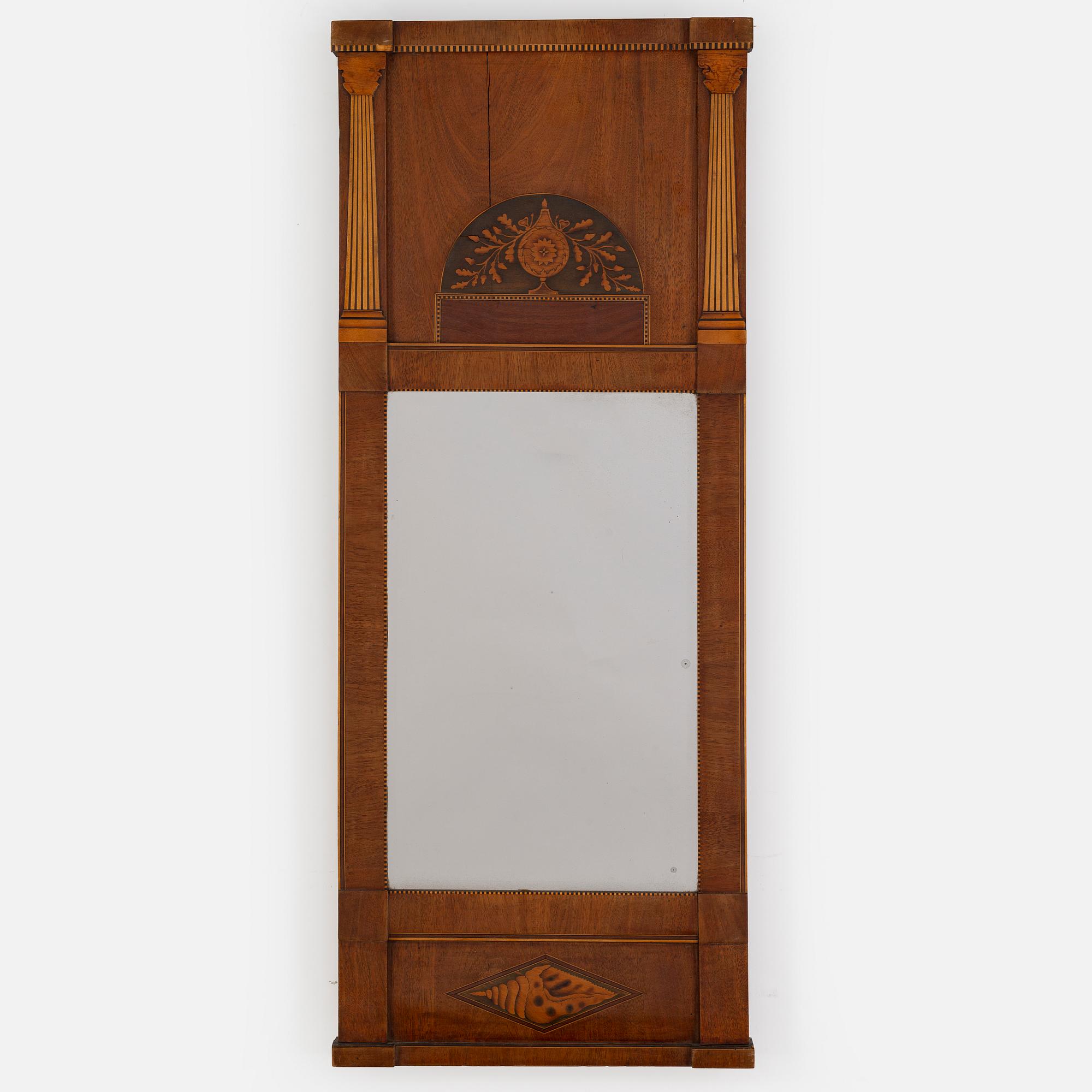 A first half of the 20th Century mahogany veneered mirror.