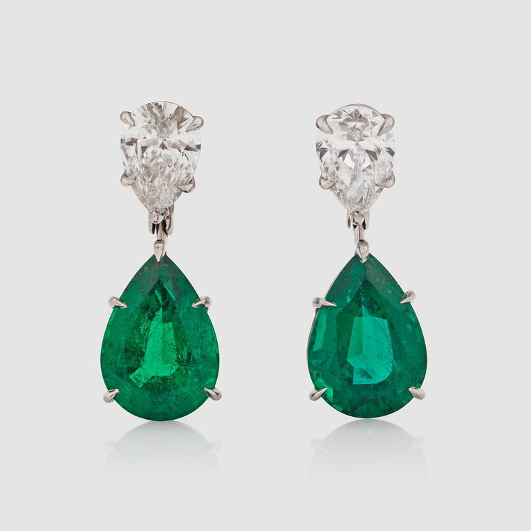 A pair of pear shaped emerald, 5.52 cts in total, and diamond, 1.60 cts in total, earrings.