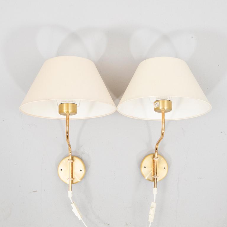 A pair of Belid brass wall lamps later part of the 20th century.