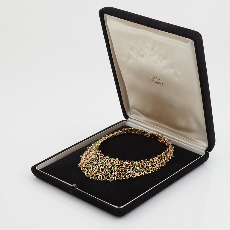 A emerald and brilliant cut diamond necklace by Gilbert Albert, Geneve, Zürich.