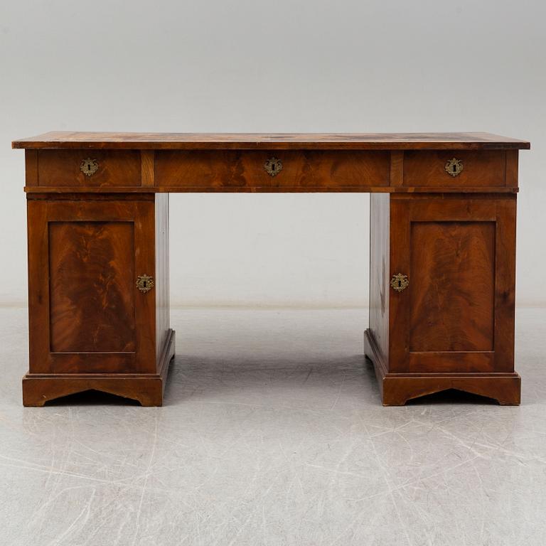 A first half of the 19th Century mahogany writing desk.