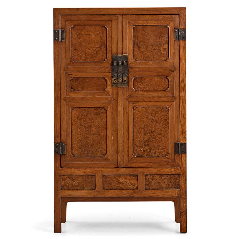 A huanghuali veneered, huamu and mixed wood cabinet, 19th century, Qing dynasty, 19th Century.