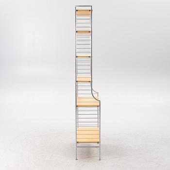 Nils Strinning, stringhylla, "Continental" 1900-talets mitt.