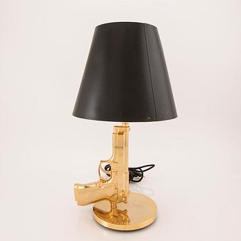 Philippe Starck, bordslampa, "Gun bedside Lamp", Flos, Italien.