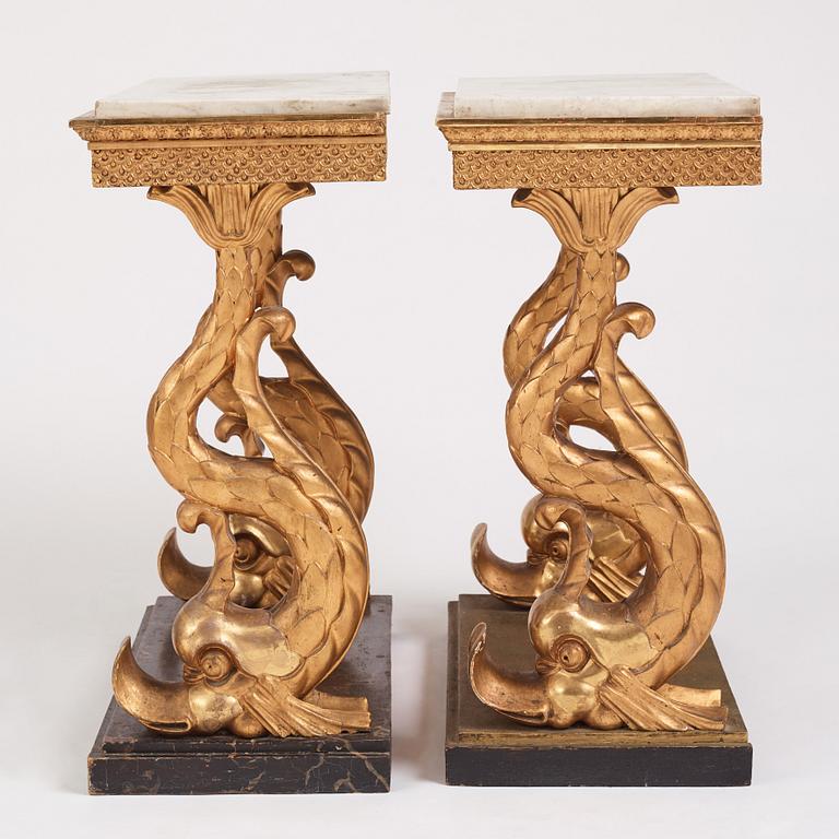 A matched pair of Swedish Empire console tables, first half of the 19th century.