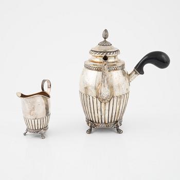 A Gustavian style silver coffee pot and a creamer, GAB, Stockholm 1904.