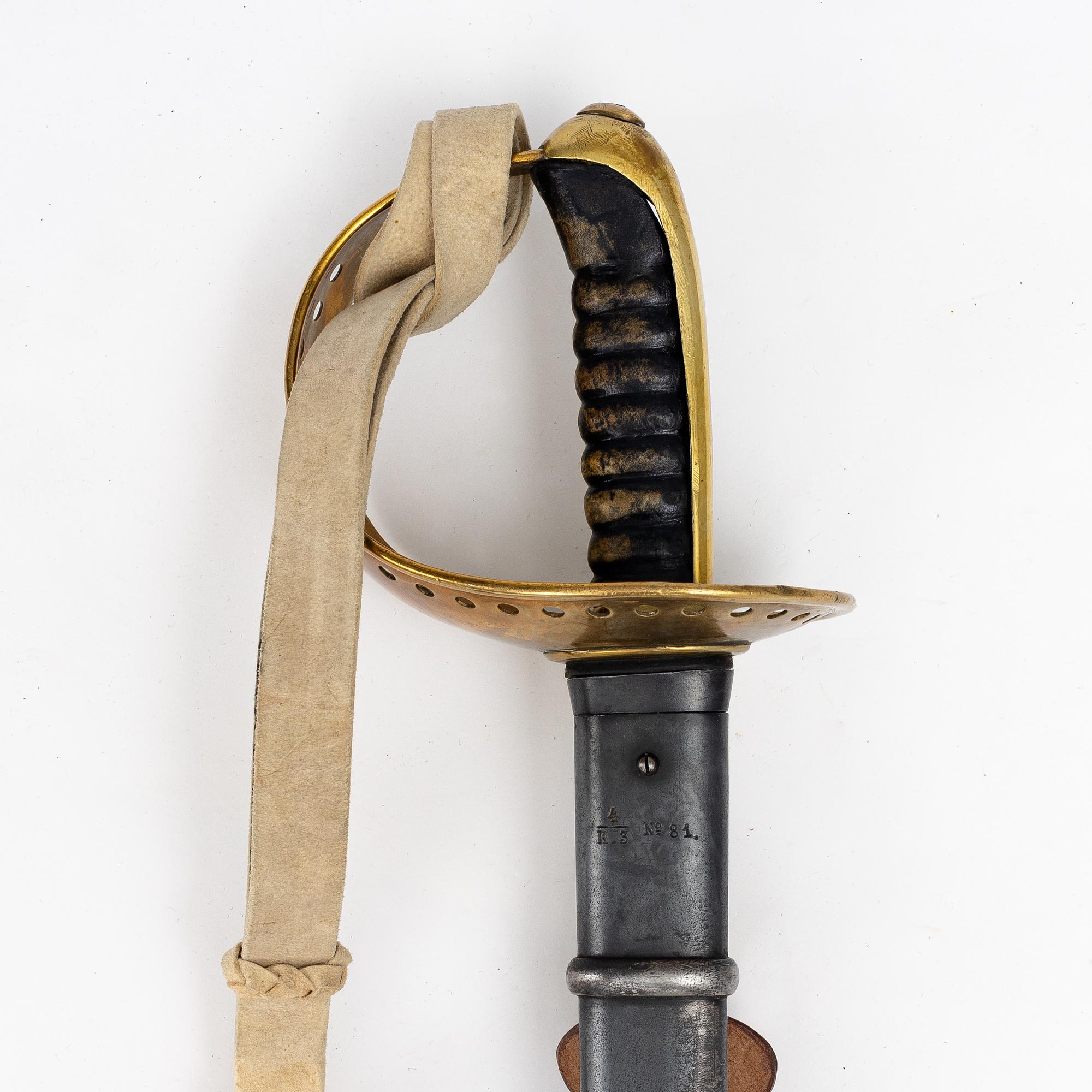 A Swedish 1893 pattern cavalry sabre, with scabbard.