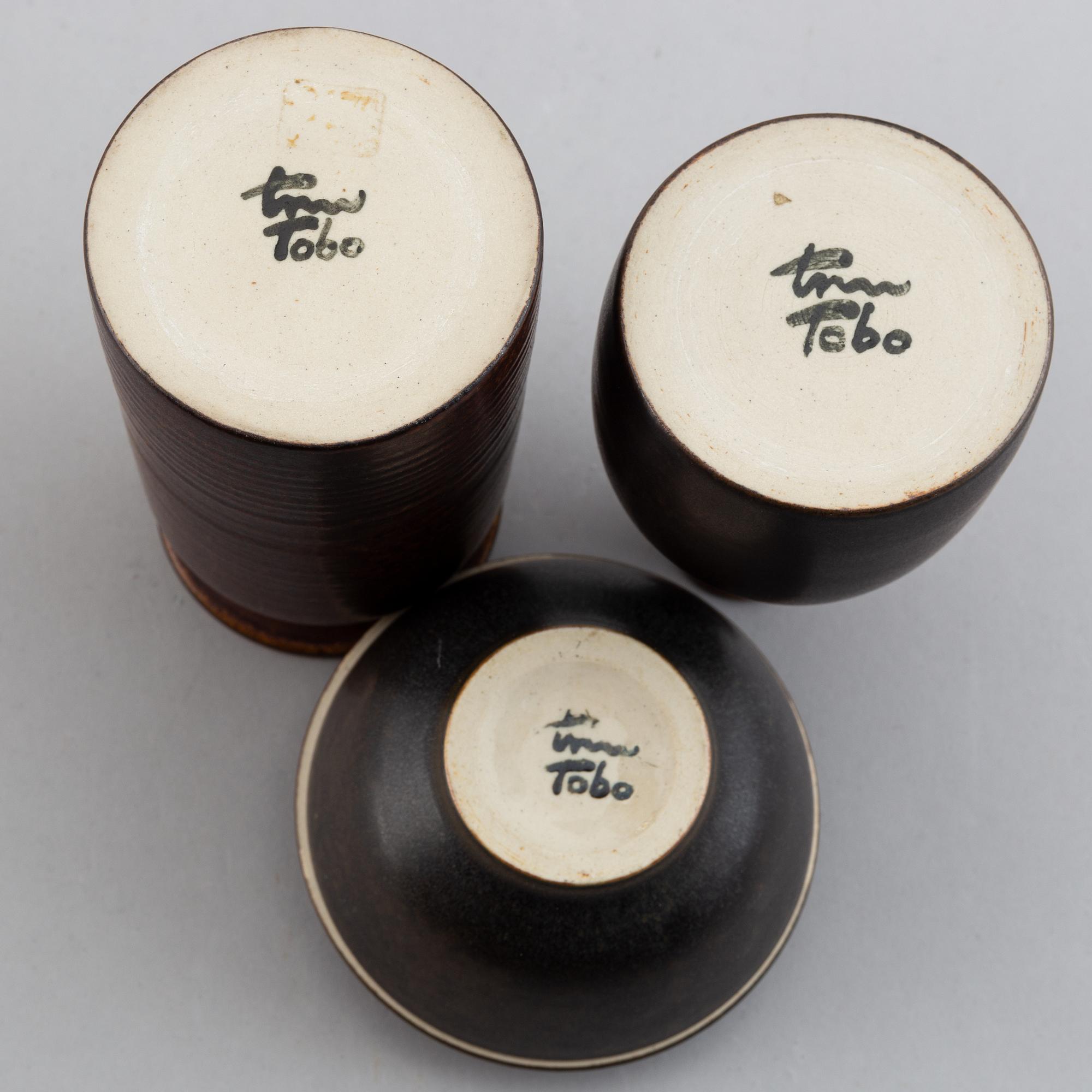 Erich & Ingrid Triller, a glazed stoneware lidded bowl and two vases, Tobo.