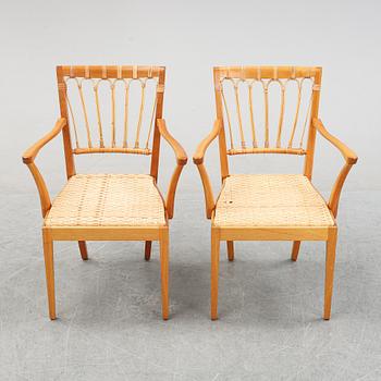 A pair of mahogany armchairs, model 1165, designed by Josef Frank in 1946 for Firma Svenskt Tenn.