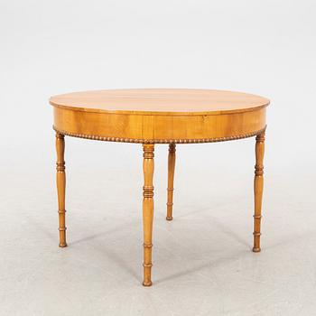 A kid 1800s late Empire birch game table.