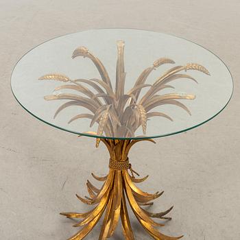 A GLASS TOP SIDE TABLE , PROBABLY HANS KÖGL, 1960-70'S.