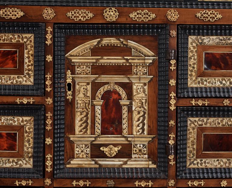 A Baroque 17/18th century cabinet, on later stand.