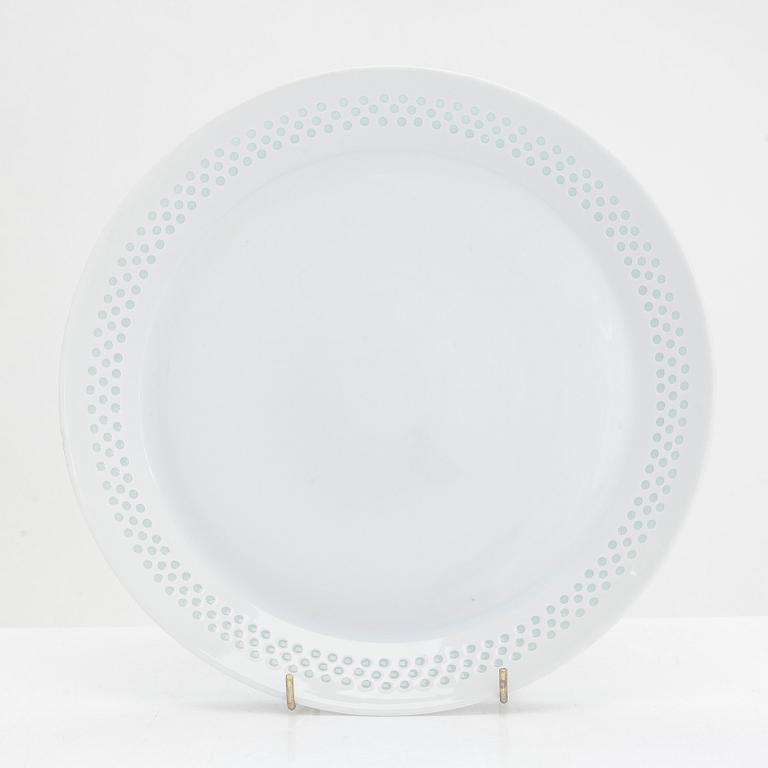 Friedl Holzer-Kjellberg, three porcelain candle holders and a "Helmi" plate, Arabia, 1970s.