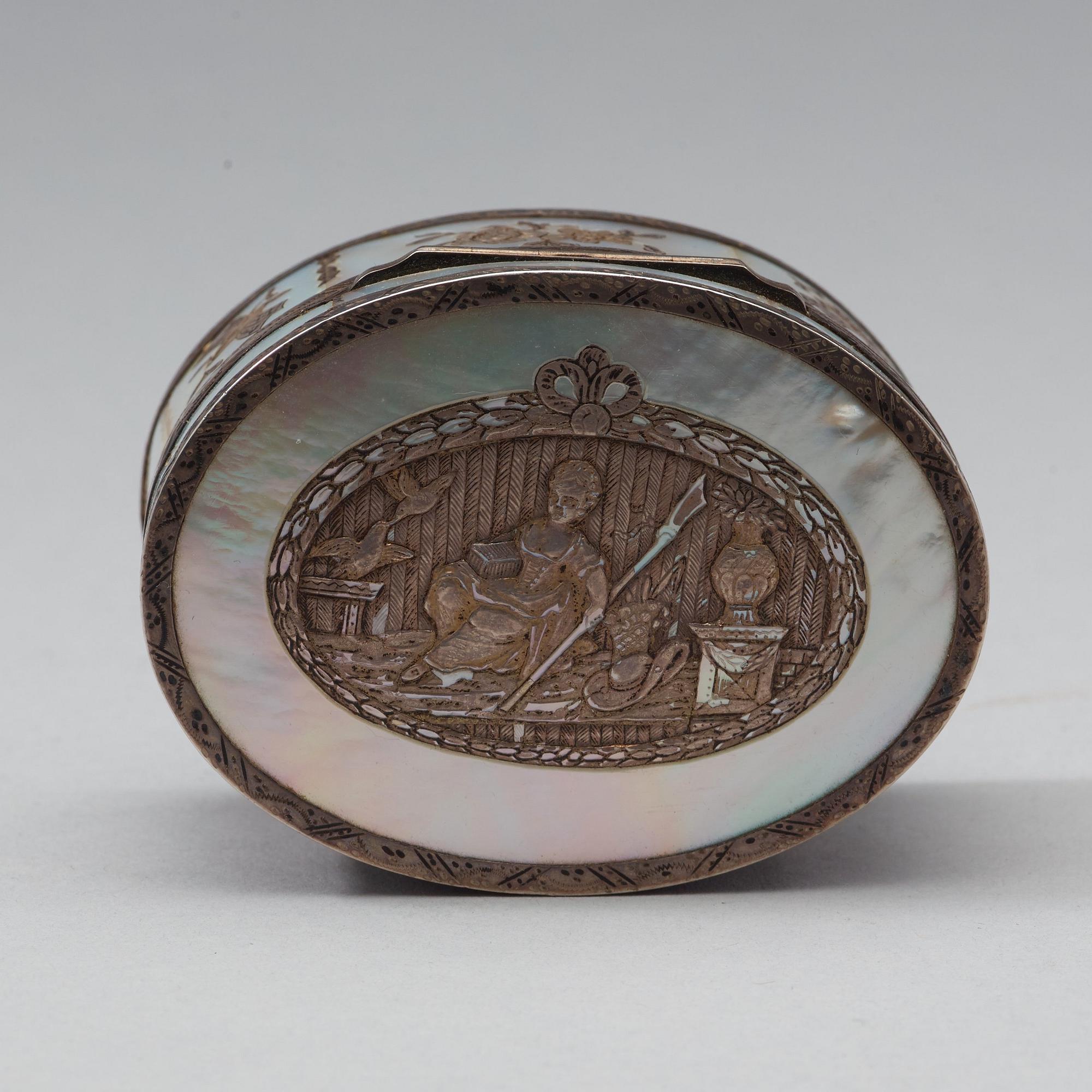 A French 18th century mother of pearl,tortoiseshell and silver snuff-box, marked Paris 1769.