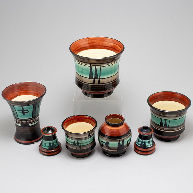 MAGGI WIBOM, a set of 7 faience vases, flower pots, candle holders, Bo Fajans, Sweden, 1920-30s.