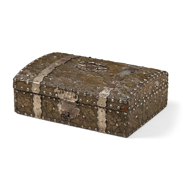 A presumably German baroque repoussé brass writing box, late 17th century.