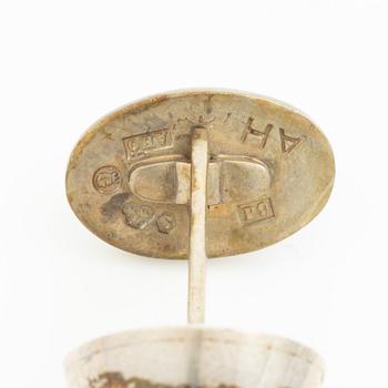 Four pairs of cufflinks, silver, including those by Anders Högberg and Cecilia Johansson.