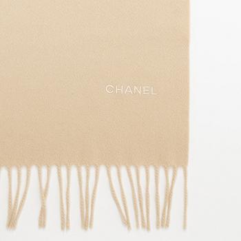 Chanel, a beige cashmere scarf.