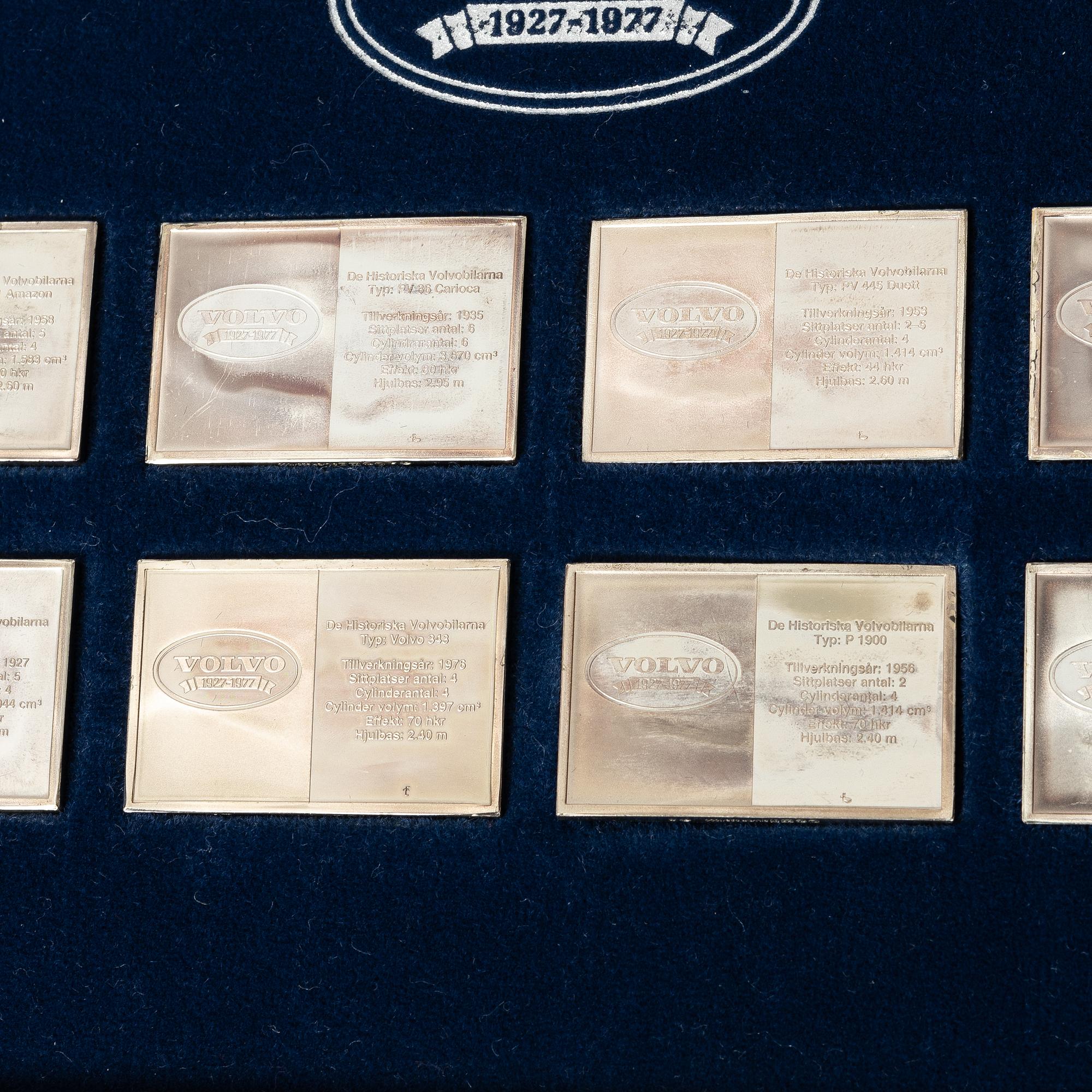 Plaketter, 12 st, silver, "De Historiska Volvobilarna 1927-1977", Franklin Mint.