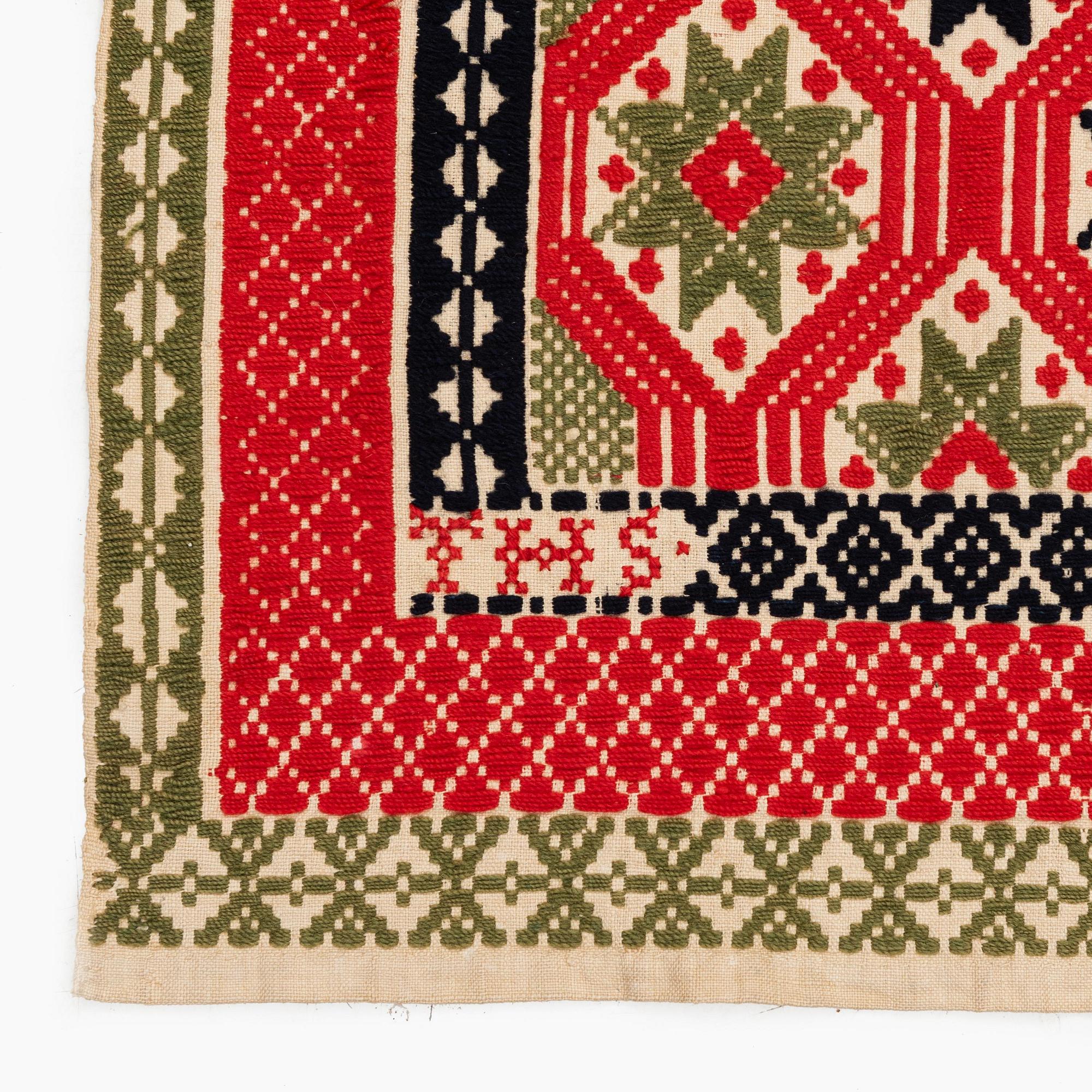 A bed cover, flat weave, c. 186 x 134 cm, Western Scania, signed THS and dated 1843.