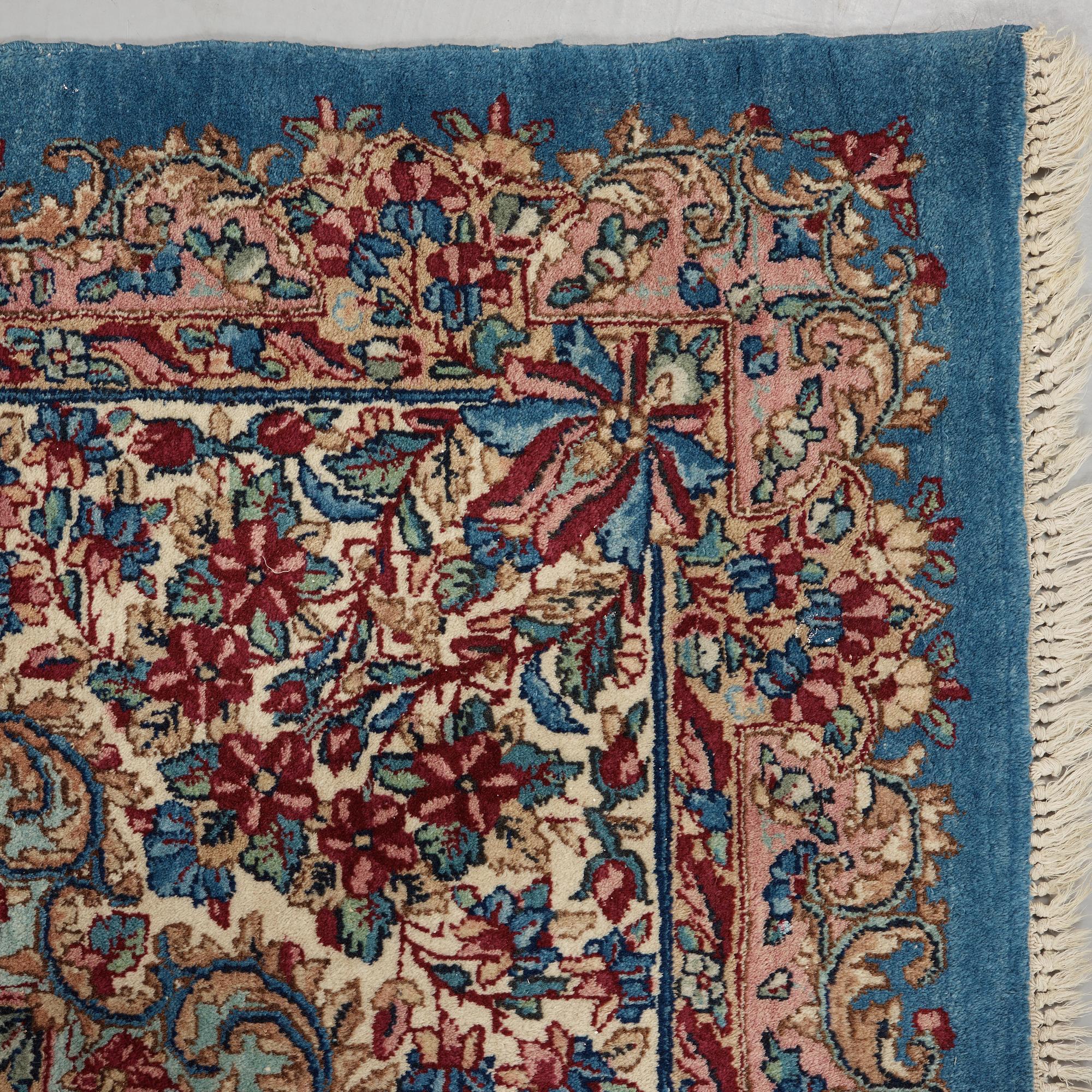 A semi-antique Kerman carpet,  440 x 296 cm.