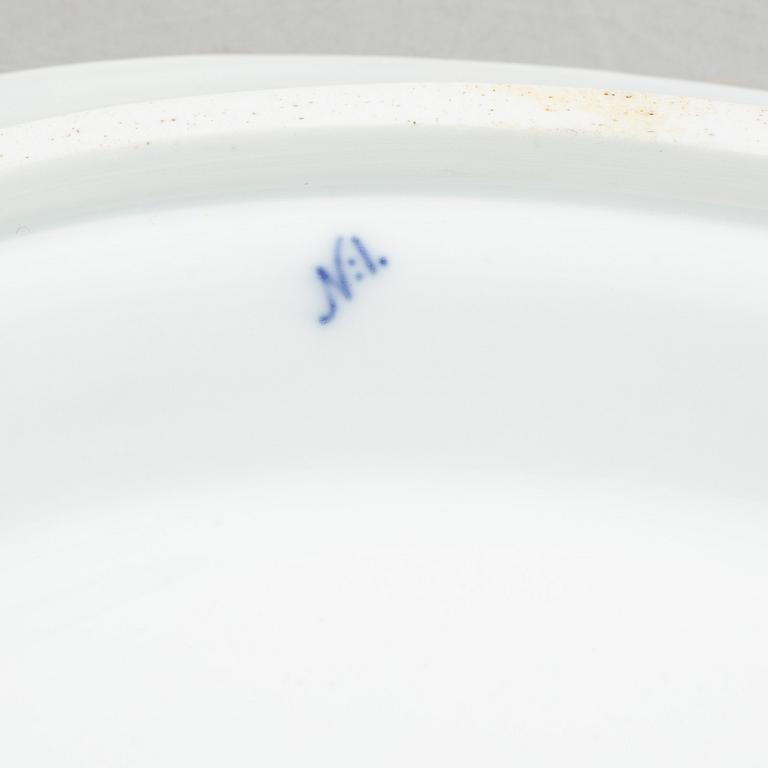 A porcelain 'Blue fluted half lace' / 'Musselmalet' tureen with cover and stand, Royal Copenhagen, 19th century.