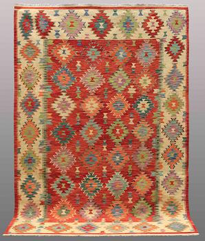 A carpet, KIlim, ca 296 x 197 cm.