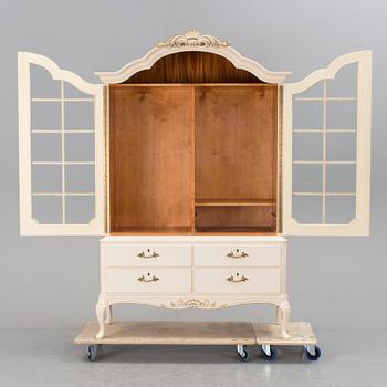 A mid 1900s cabinet by Oscar Edv Ekelunds Snickerifabriks AB, Virserum.