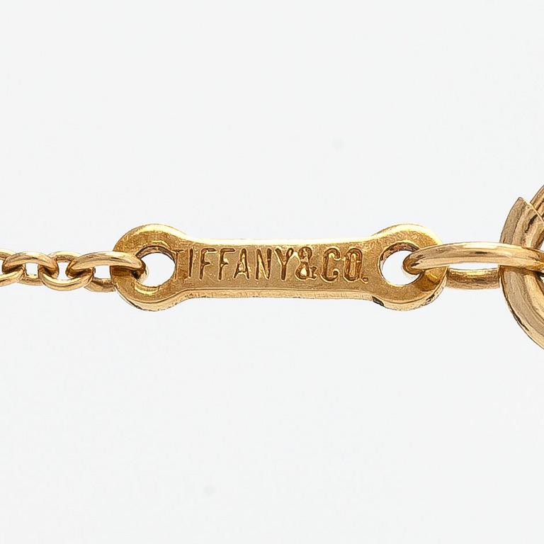 Tiffany & Co, Elsa Peretti, an 18K gold 'Bean' necklace.
