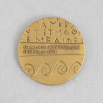 Deltagarmedalj OS, Aten 2004 samt tygmärke för den svenska OS-truppen.