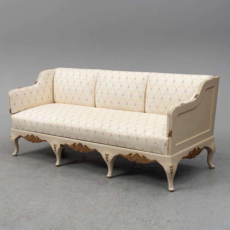 An early 20th century rococo revival sofa.