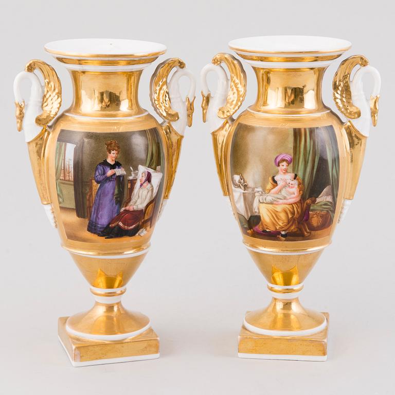 A pair of 19th century porcelain urns / vases.