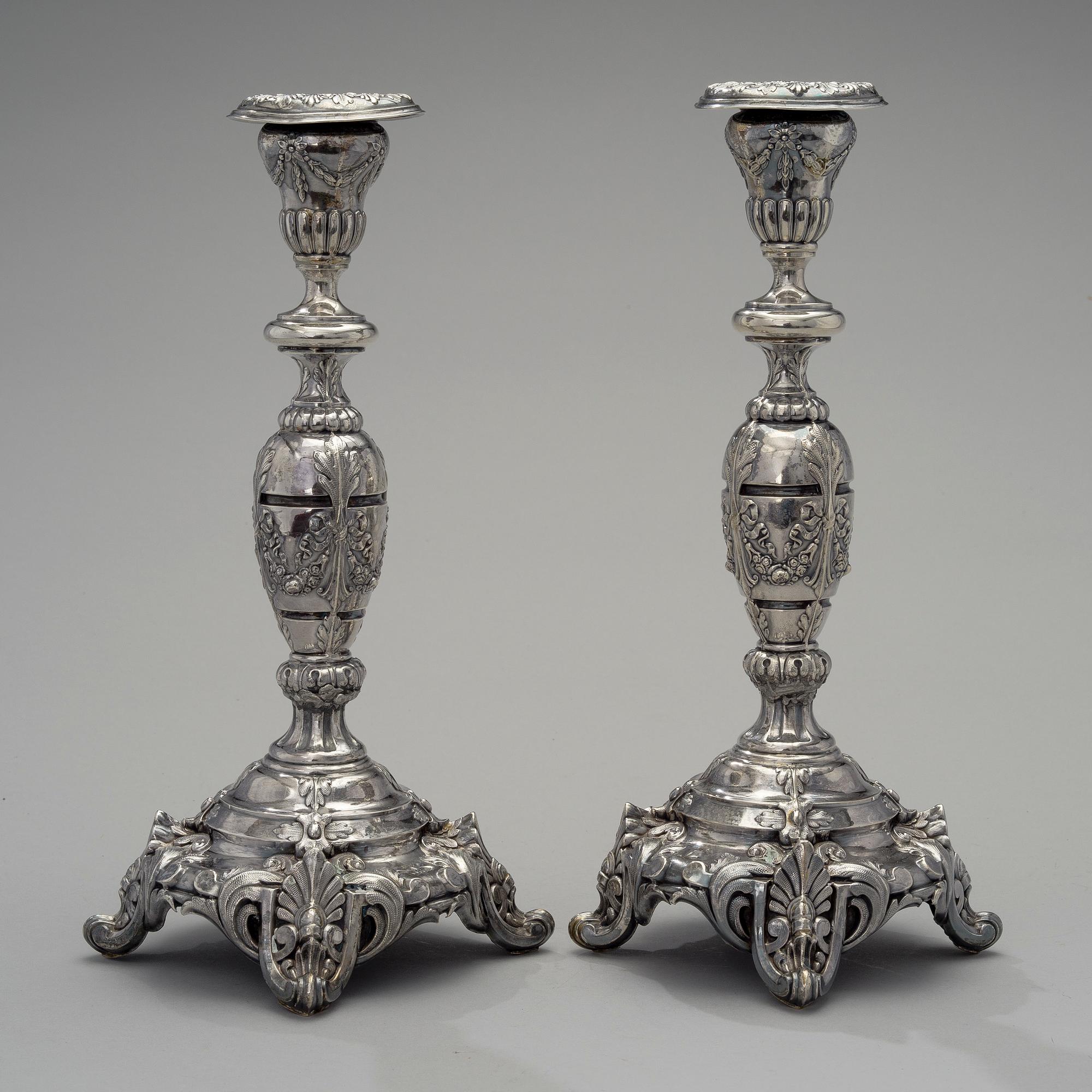A pair of silver candlesticks by Teodor Werner & son, Warsaw 1876-1896. Weight 700 g.