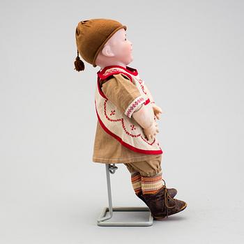 A bisque headed boy doll 235 by S.F.B.J, Paris, France, 1910s.