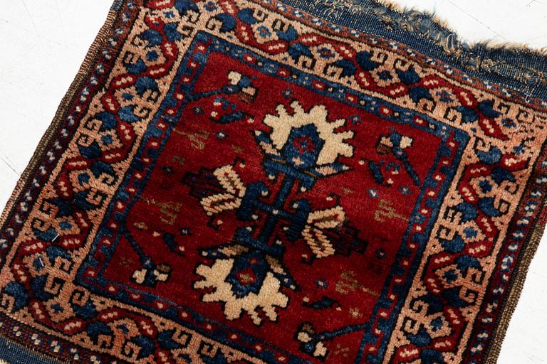 An Antique Saddlebag, so-called Heybe, Anatolia, c. 47 x 45 cm.