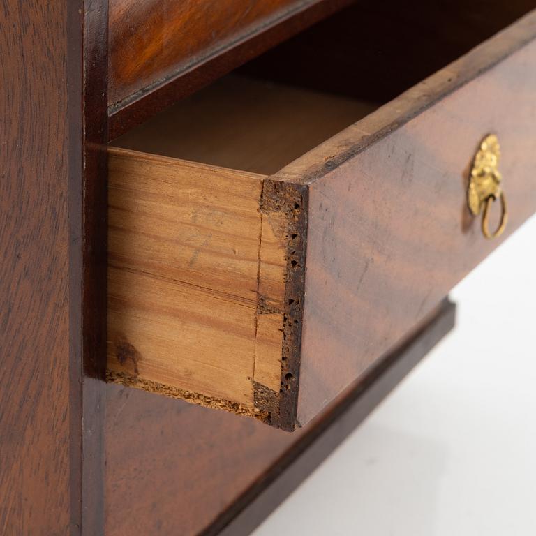 An Empire mahogany miniature commode, 19th Century.