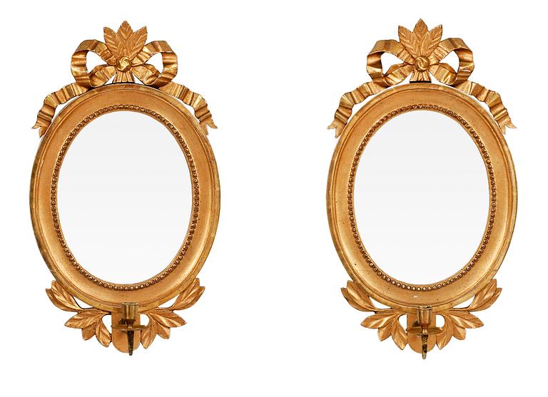 A PAIR OF ONE-CANDLE MIRRORS.