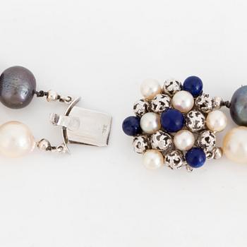 A cultured pearl necklace. Clasp 18K white gold with pearl and lapis lazuli.