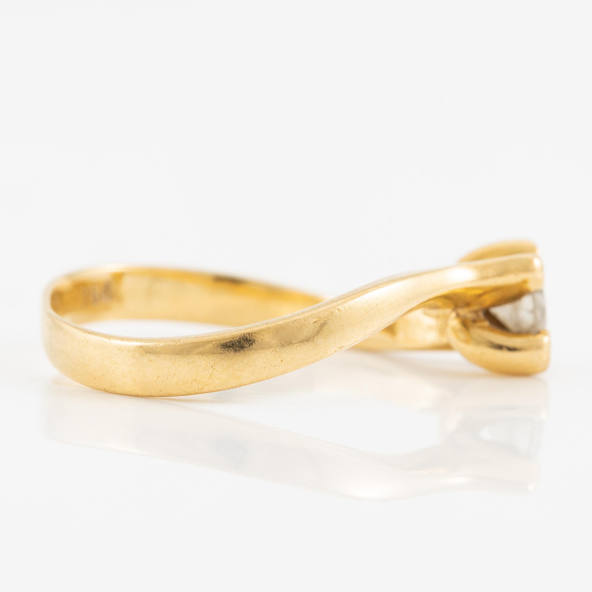 Ring, 18K guld med briljantslipad diamant.