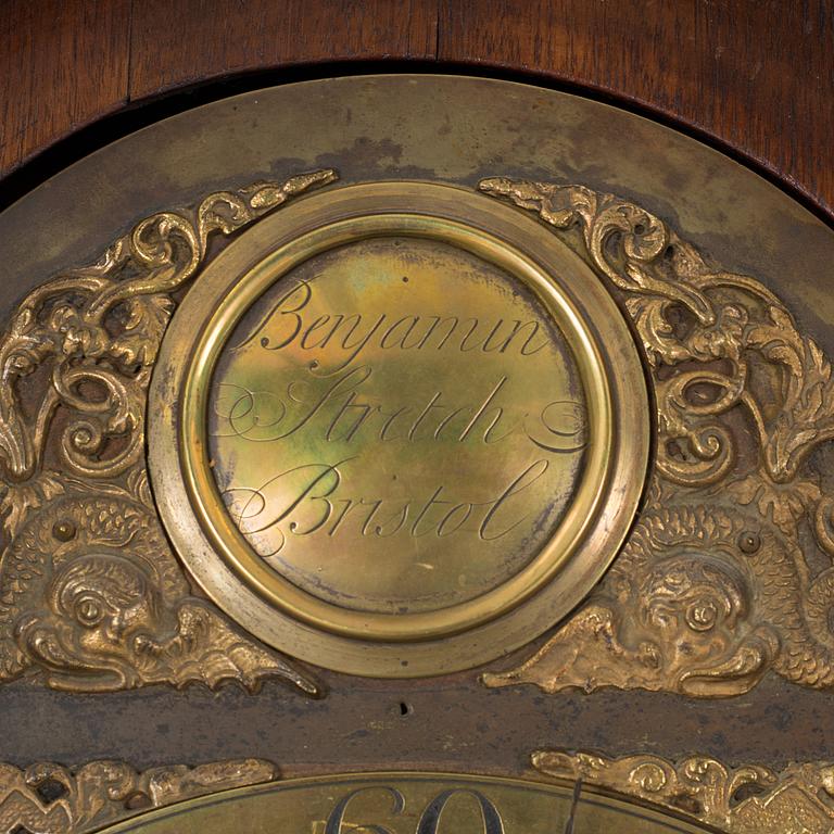 A WALNUT LONGCASE CLOCK, Benjamin Stretch, Bristol, 18th century.