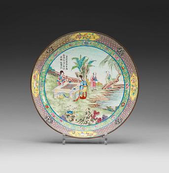 An enamel on copper dish, Qing dynasty 18th century.