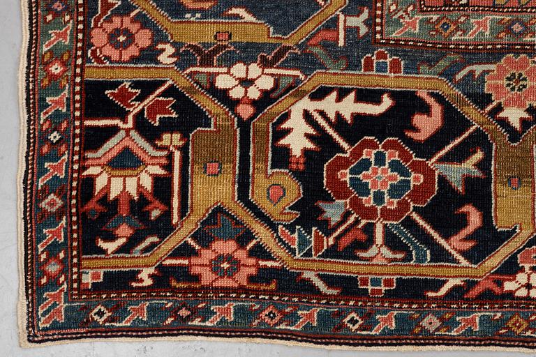 A carpet, antique Heriz, a so-called Serapi, ca 360 x 321 cm.