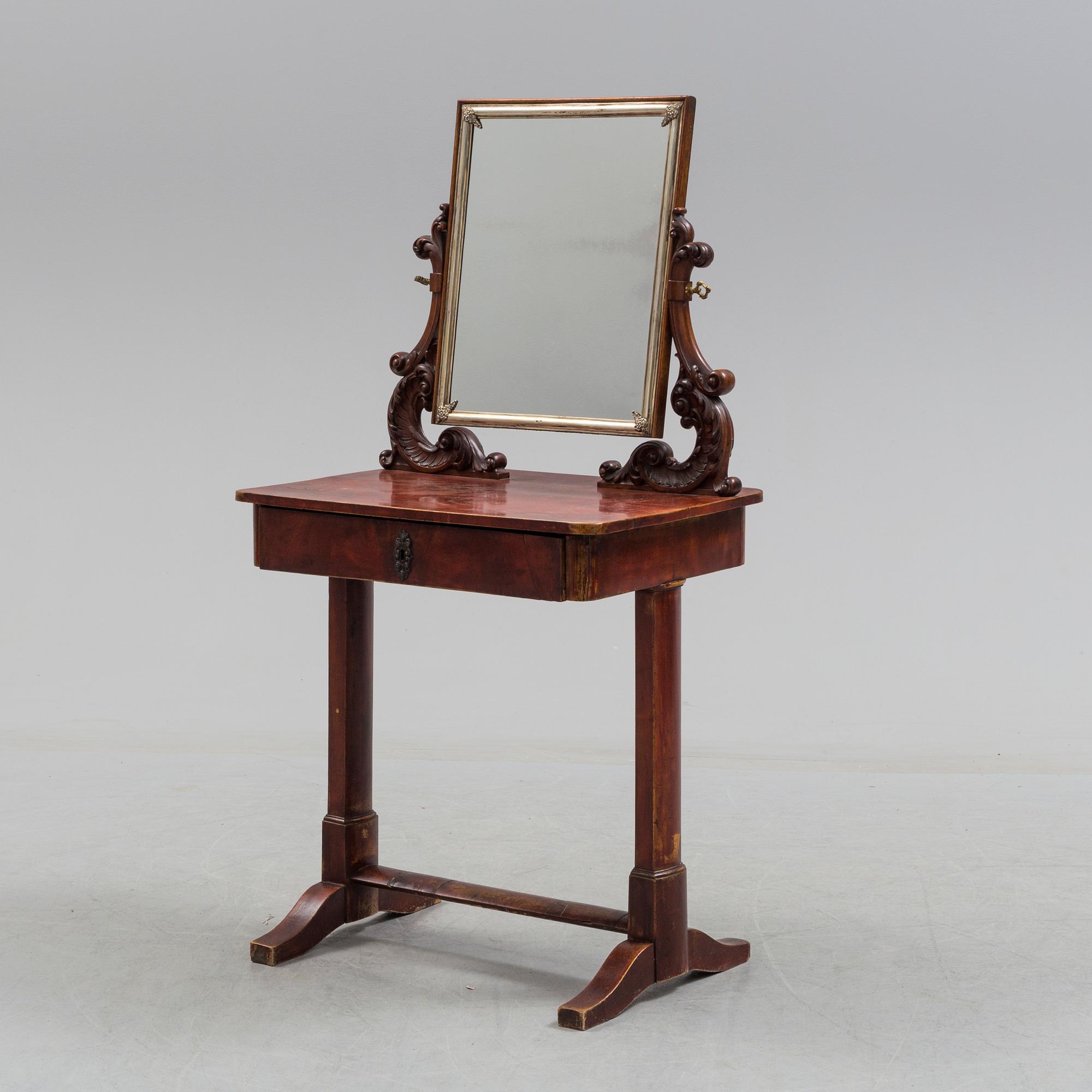 A mid 19th century late empire dressing table.