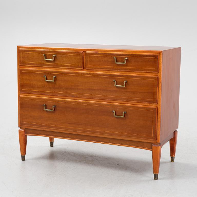 A Swedish Modern Mahogany Chest of Drawers, mid 20th century.