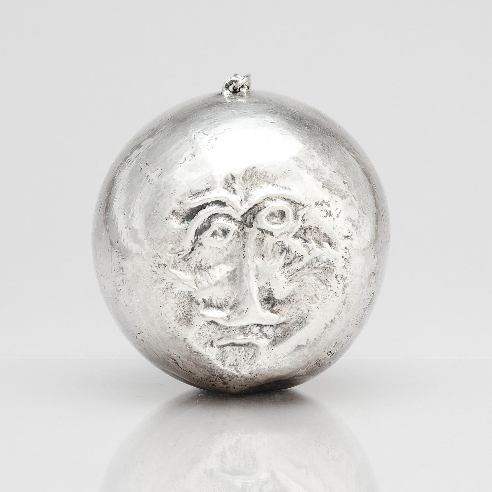 Olle Ohlsson, a silver 'man in the moon' sculpture, Stockholm.