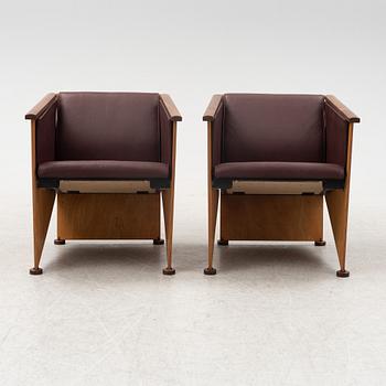 Torbjörn Ahlström, a pair of mahogany and cherry armchairs.