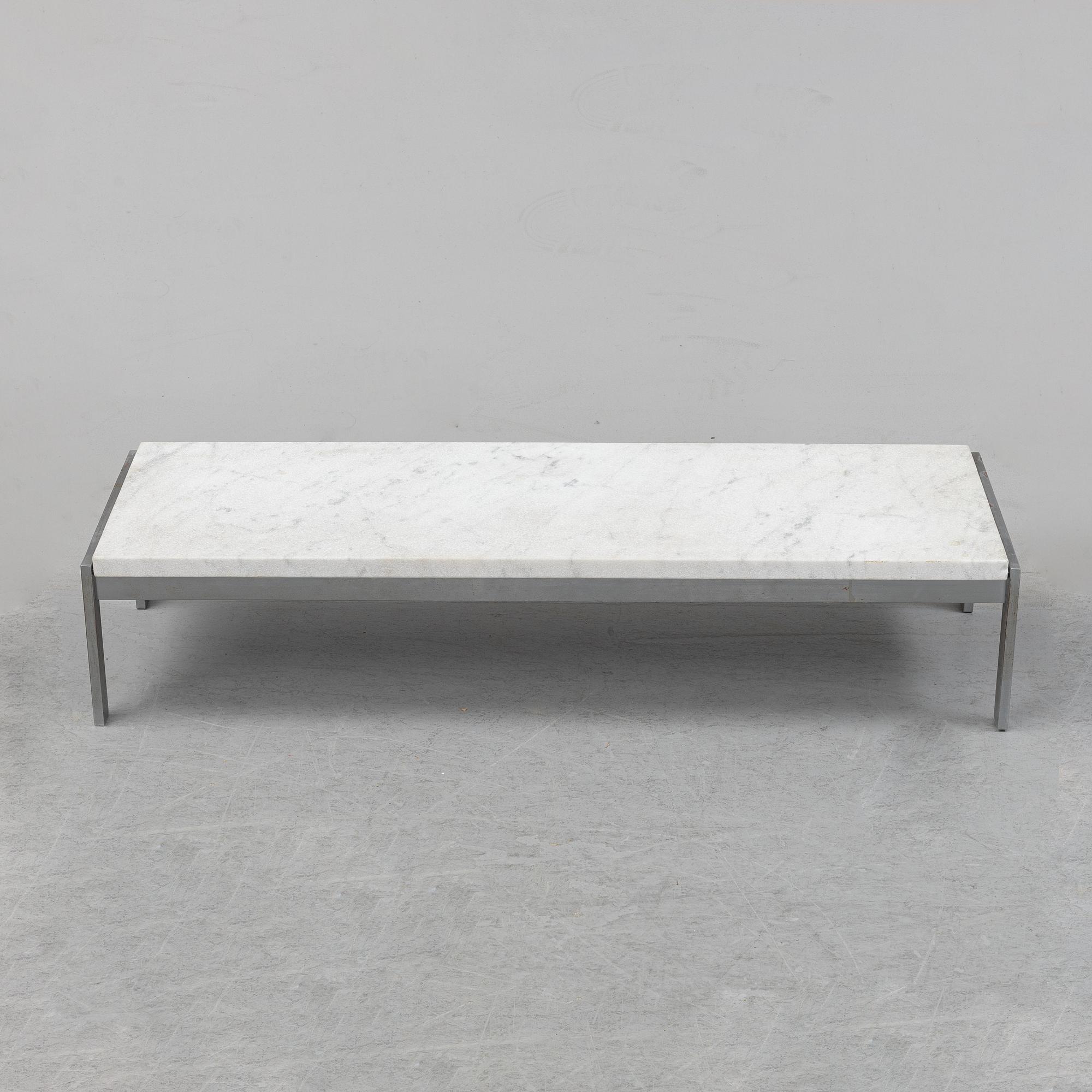 Poul Kjaerholm, a marble top 'PK 61' table, Fritz Hansen, Denmark, 1989.