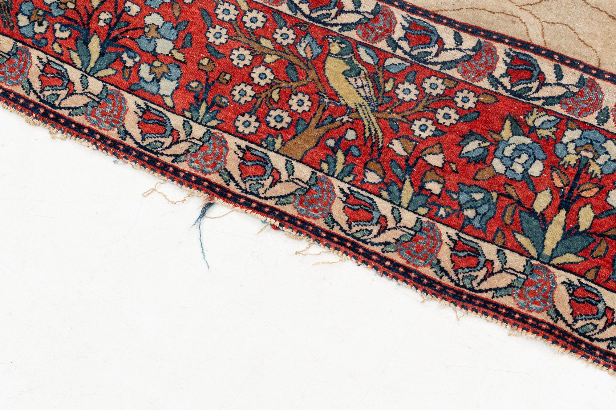 An antique/semi-antique pictoral Kashan rug, ca 215 x 140-144 cm.