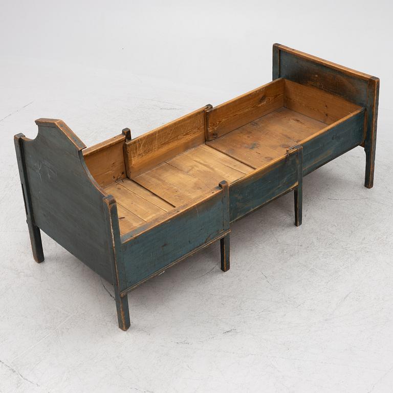 A 19th Century Painted Children's Bed.